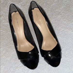 Black patent leather pumps